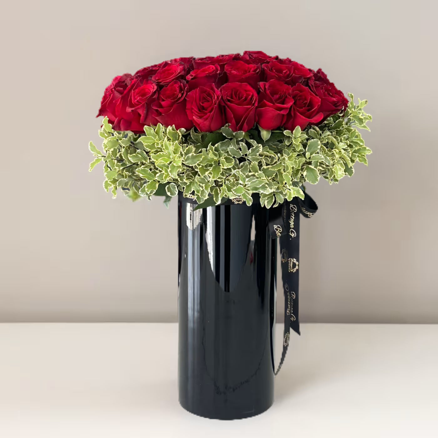 Red Roses in a Cylinder Vase